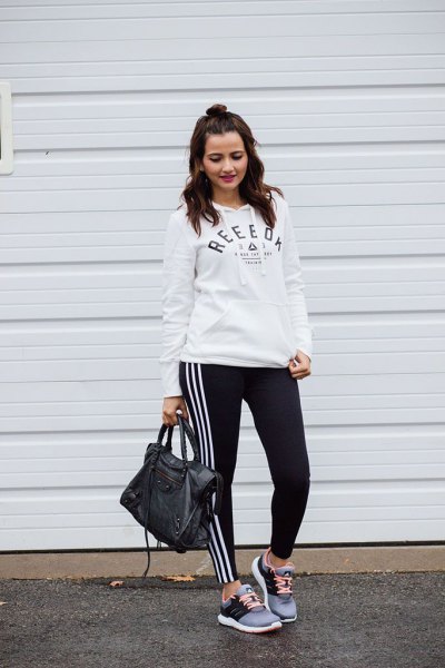 white hoodie with black and white adidas leggings