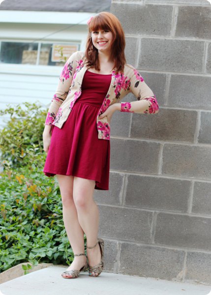 red mini dress with fit and flap with blush jacket with floral pattern