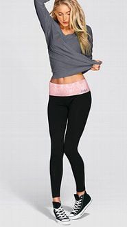 gray long-sleeved t-shirt with black leggings and high canvas shoes