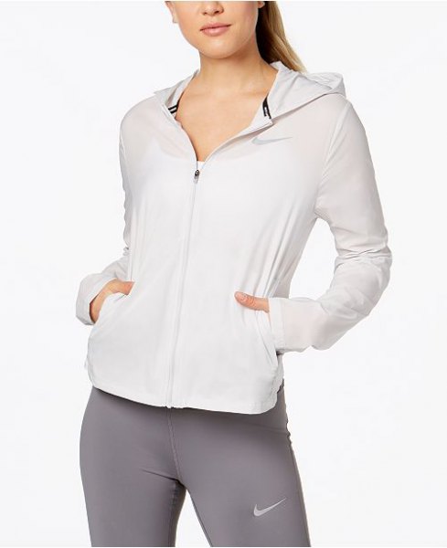 white running jacket with gray tights