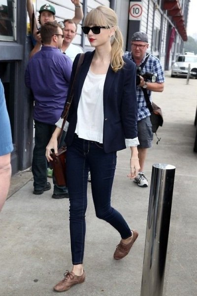 Navy blue blazer with white chiffon blouse and gray oxford evening shoes