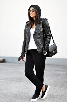 Moto jacket with slim jeans and black leather sneakers