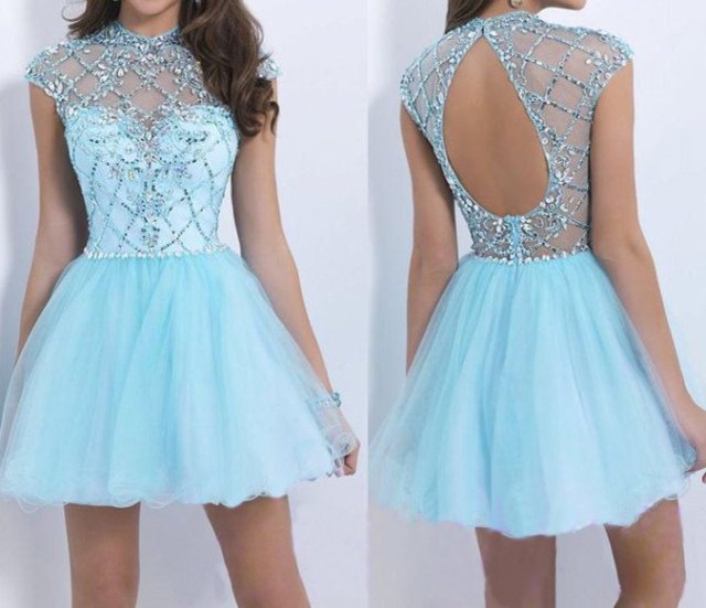 Mini-fit with an open back and light blue and silver flare dress