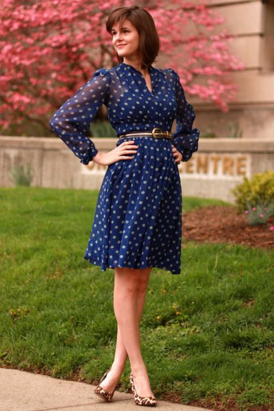 Long-sleeved knee-length blue polka dot dress with chiffon belt and belt
