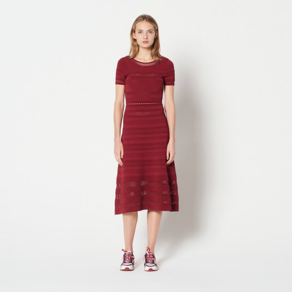red, medium-length short-sleeved dress with short sleeves and sneakers
