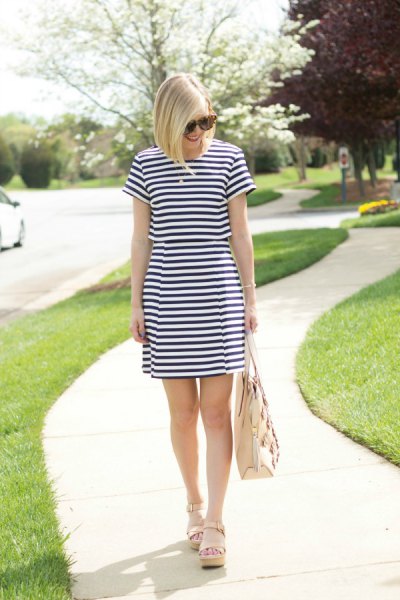 dark blue and white striped mini dress with light pink sandals