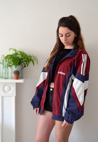 Vintage red, white and navy blue windbreaker with black mini denim shorts