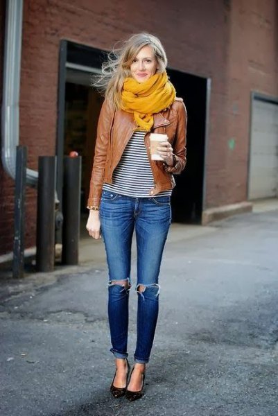 orange chiffon scarf with brown motorcycle jacket and black and white smart t-shirt