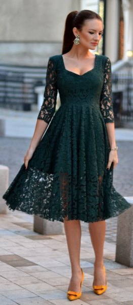 dark gray three-quarter sleeved lace dress and flared midi dress with yellow heels