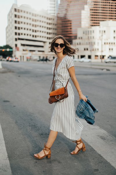 gray and white midi dress with gathered waist and red heels