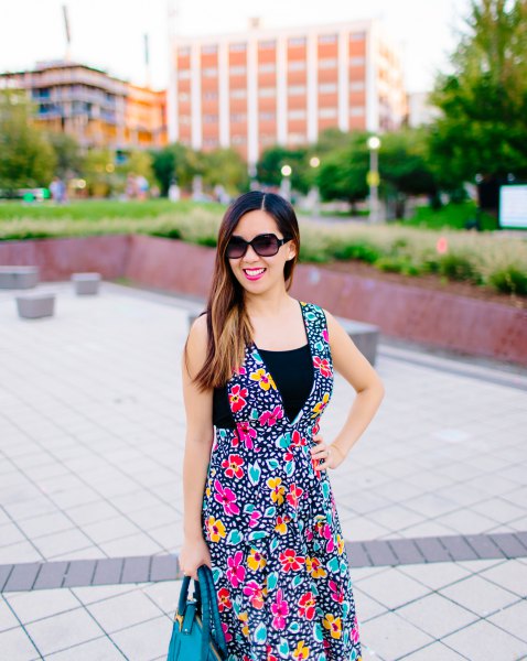 Black red and blue dress with deep v-neck and floral pattern