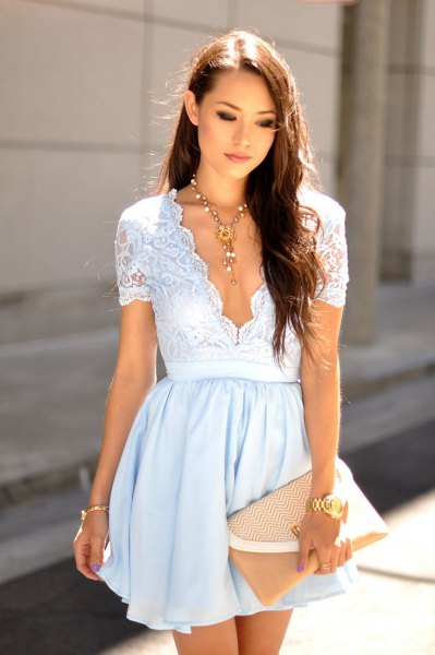 White scalloped short-sleeved mini dress with a deep V-neck and two tones