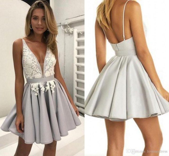 white and gray mini dress with deep V-neck and flap