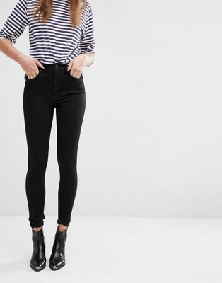 black and white striped T-shirt with high waisted skinny jeans