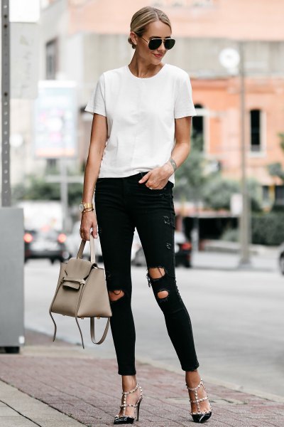 white T-shirt with black skinny jeans and strappy heels
