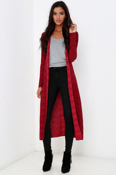 red midi cardigan with gray scoop neck t-shirt and black skinny jeans