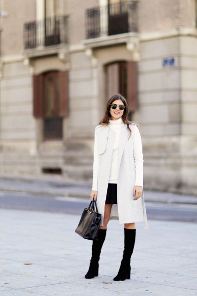 long white cardigan with imitation sweater and mini skirt