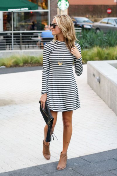 black and white striped mock neck fit and flare mini dress with brown leather ankle boots