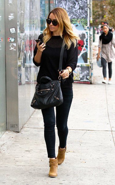 black sweater with matching skinny jeans