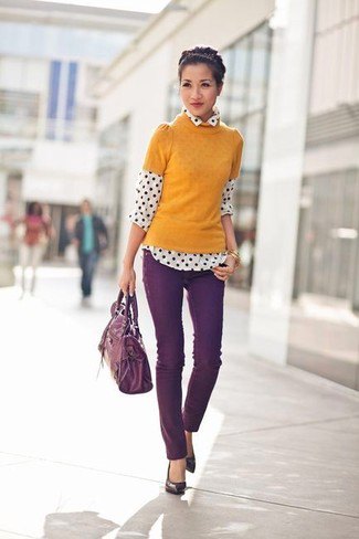 orange short-sleeved sweater with white and black polka dot shirt