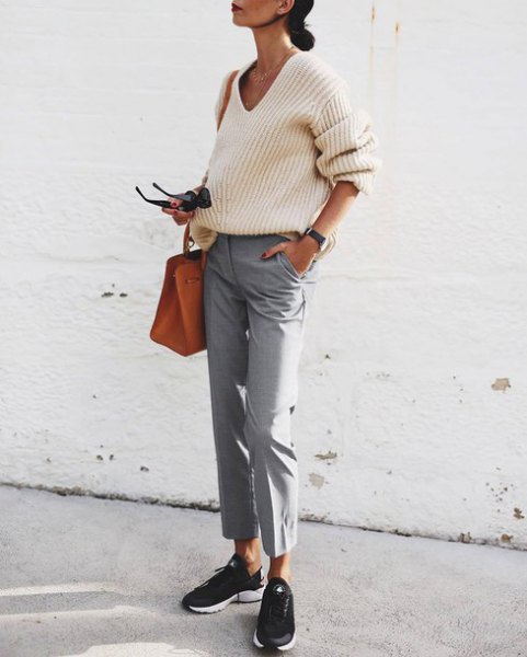 white rib sweater with V-neck and gray, short cut chinos