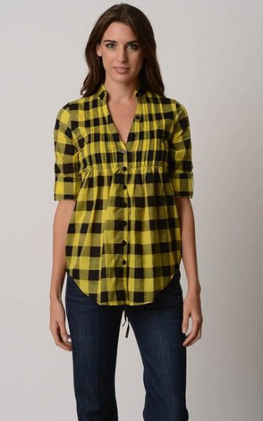 yellow-black checkered peplum shirt with dark skinny jeans