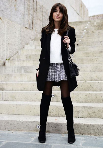 black long blazer with checkered mini skirt and over the knee boots