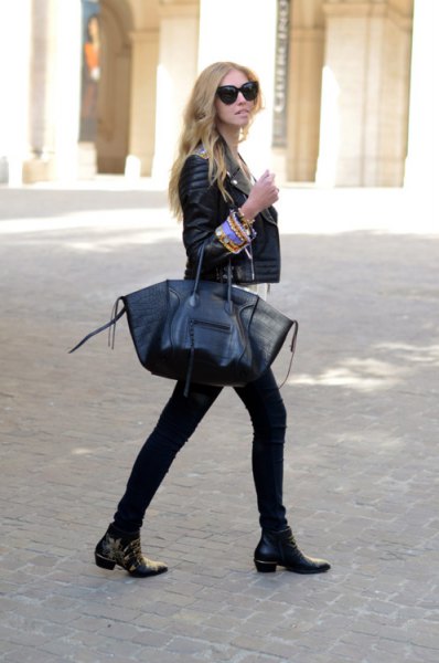 Biker jacket with skinny jeans and black leather boots