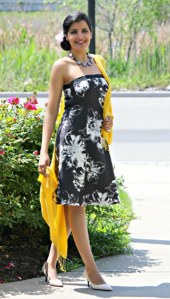 black and white tube dress with floral pattern and yellow scarf