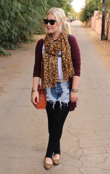 Chiffon scarf with gold and black leopard print, black cardigan and washed jeans shorts