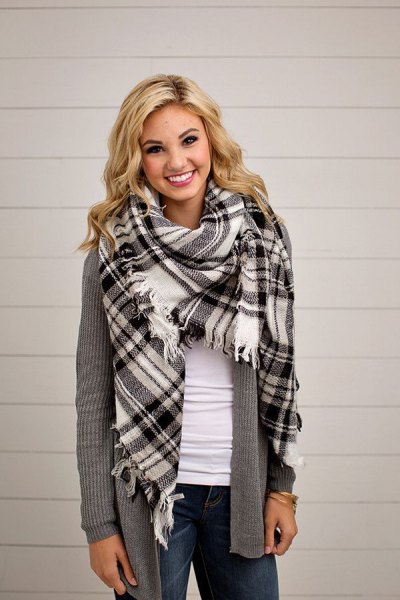 black and white checkered blanket scarf with gray, torn cardigan