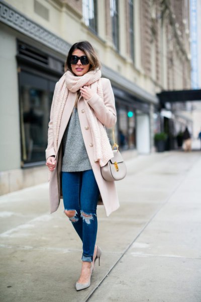 white longline wool coat with blue skinny jeans with cuffs