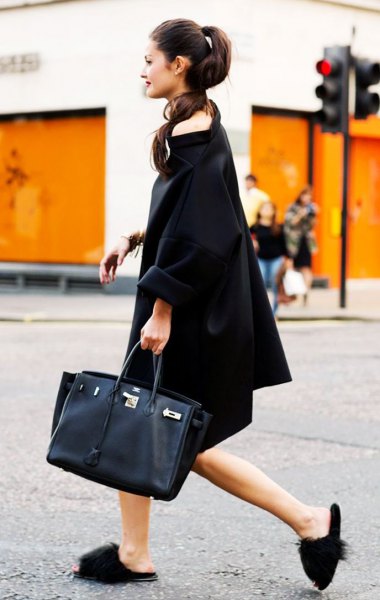black midi shift dress with submarine neckline, slippers and black leather handbag
