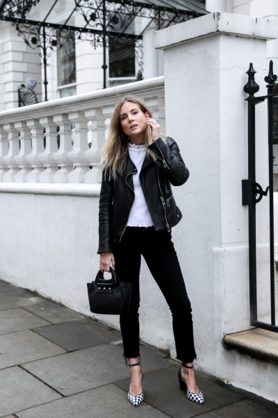 black moto jacket with skinny jeans and checkered heels