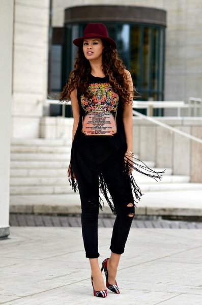black graphic sleeveless fringed t-shirt with skinny jeans and gray checkered heels