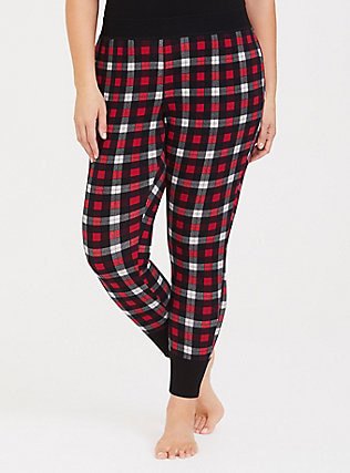 black tank top with red and white checked pajama bottoms with a tapered leg