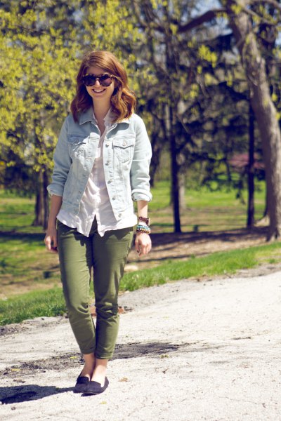 Light blue denim jacket with white linen blouse and green slim fit pants
