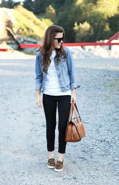 blue denim jacket with white graphic t-shirt and short jeans
