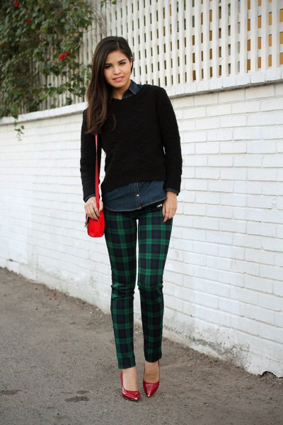 black sweater with dark blue and gray checked tube pants