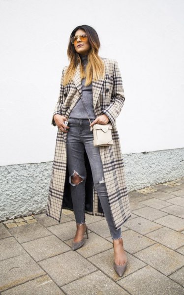 blushing pink and black maxi check coat with gray, torn jeans