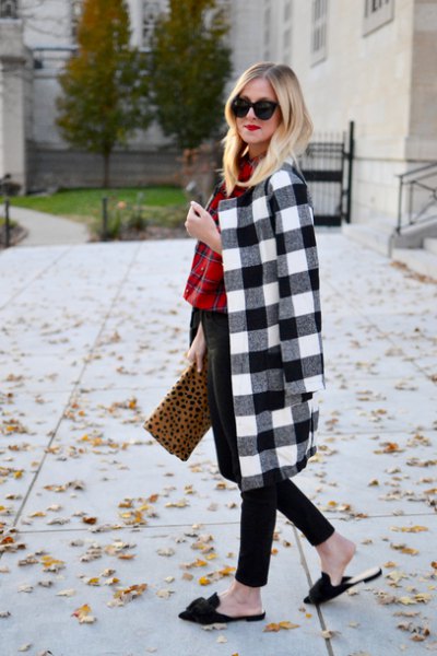 black and white checked longline wool coat with clutch bag with leopard print