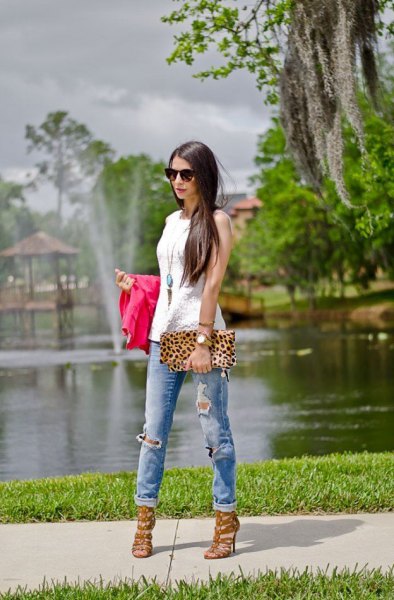 white sleeveless top with clutch with leopard print and pink strappy heels