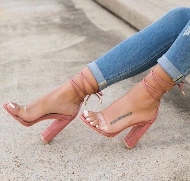 blue skinny jeans with cuffs and pink strappy sandals with open toes