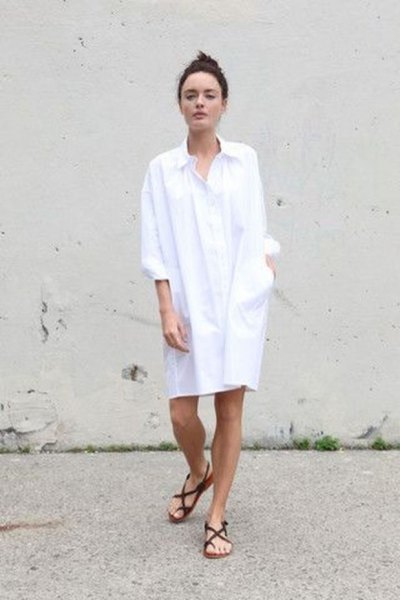 white tunic shirt dress with buttons and black flat sandals