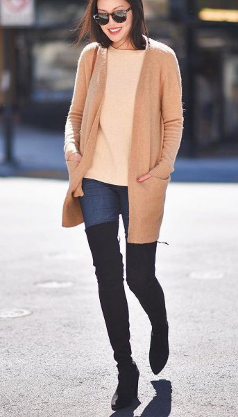 Blush pink wool coat with ivory sweater and over the knee boots