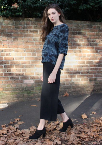 black velvet top with maxi skirt and high-heeled ankle boots