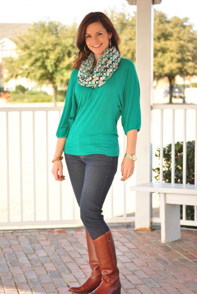 green long-sleeved chiffon top with infinity scarf and brown boots