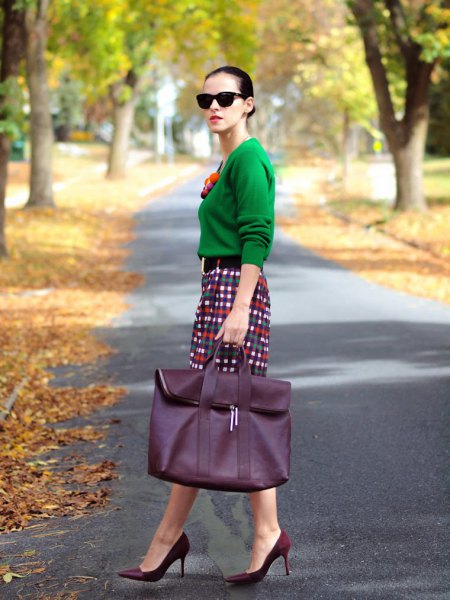 emerald green sweater with checkered pencil skirt