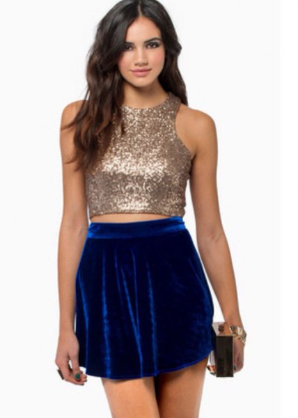 sparkling rose gold crop top with blue velvet mini skirt