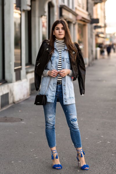 Denim jacket with torn jeans and royal blue strappy sandals